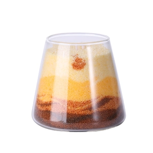 Handmade gradient sand art scented soy candle in a clear glass jar for home decor