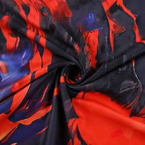 Détail macro du tissu imprimé abstrait rouge et noir de haute qualité avec maille fine