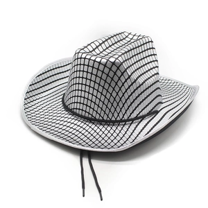Detail of silver checkered cowboy hat with reflective finish and black chin strap
