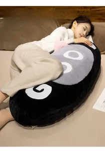 Close-up of a long plush cat pillow being used as a cozy sleeping body cushion