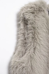 Close-up of premium gray faux fur texture showing soft fluffy fibers and elegant shine