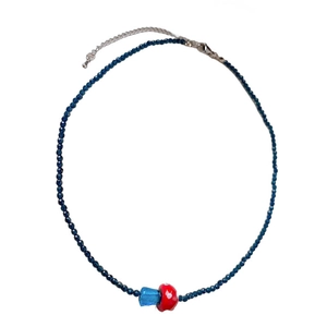 Blue glass beaded necklace with cute red mushroom pendant and lobster clasp detail