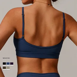Navy blue racerback sports bra with adjustable thin straps for running and yoga