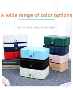 Stack of multi-colored portable PU leather jewelry boxes with metal button closure