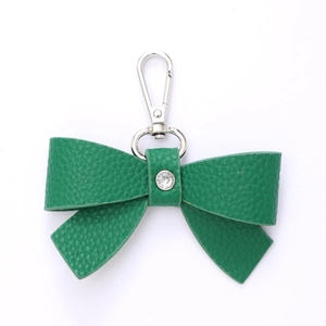 Green leather bow keychain with crystal detail and silver lobster clasp for handbags