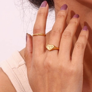 Detail of 18K gold-plated stainless steel heart signet ring with 11:11 engraving