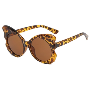 Modern oversized butterfly sunglasses with classic leopard print frames and brown lenses