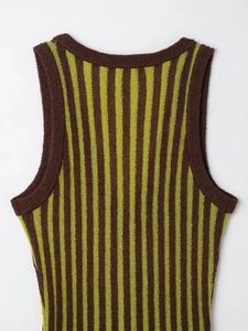 Close-up of vertical brown and green striped knit texture on a sleeveless dress