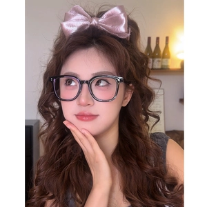 Pink silk bow hair clip and black oversized glasses set for elegant high ponytail styling