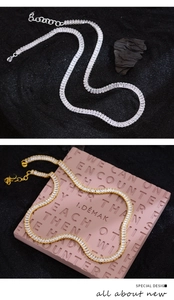 Detail of luxury rectangle cubic zirconia tennis necklaces in gold and silver finishes