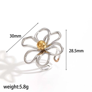 Hollow floral stainless steel open ring with silver petals and golden center bead