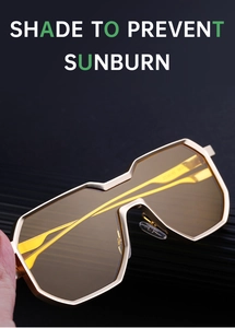 Macro shot of punk style amber lenses with gold metal frame and model ZS38143 detail