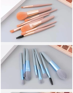 Detailed comparison of pink and blue portable 8-piece soft synthetic makeup brush sets