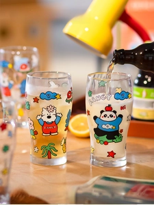 Detail of pouring beer into a glass with cartoon panda and dog illustrations