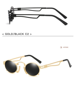 Detail view of gold and black steampunk oval sunglasses with metallic finish and sleek arms