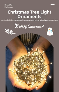 Close-up of warm white LED Christmas tree string lights with flexible black wires
