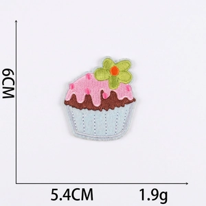 Detailed cupcake embroidery patch showing dimensions 6cm x 5.4cm and weight 1.9g