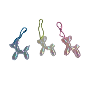 Three-piece set of iridescent laser balloon dog keychains with colorful metallic finish