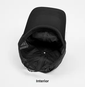 Detail view of black quick-dry sports cap featuring breathable mesh lining and metal buckle