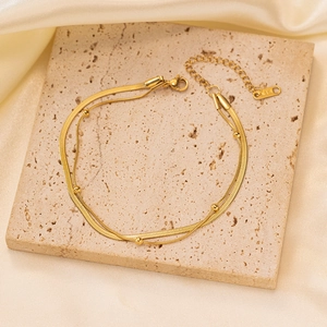 Collar de capas en acero inoxidable dorado con cadena de serpiente y cierre de langosta