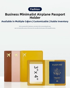 Detail of PU leather passport covers in three colors featuring golden airplane logo and card slot