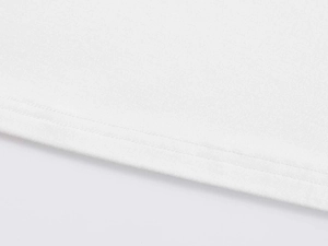 Detail of white cotton T-shirt featuring high-quality double-needle hem stitching and fabric