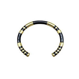 Minimalist black and gold enamel open bangle with segment design in polished metal