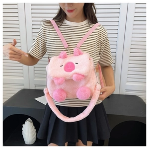 Detailed view of pink plush Capybara backpack with adjustable straps on a model