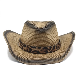 Brown woven straw cowboy hat with leopard print band and curved brim for outdoor style