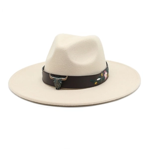 Detail of cream felt fedora featuring bull head metal buckle and floral embroidery