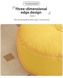 Detail shot of a yellow round futon floor cushion with premium woven texture and piping