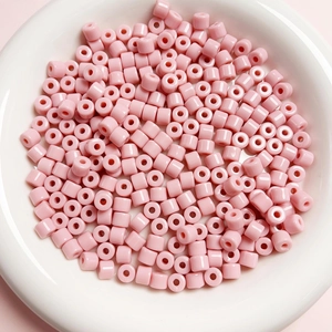 Macro di perline cilindriche rosa da 6 mm in acrilico per gioielli fatti a mano