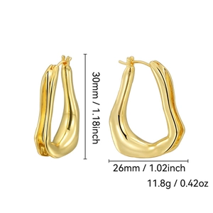 Irregular wave-shaped gold-plated earrings with dimensions 30mm and polished finish