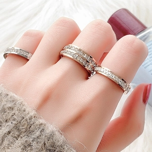 Elegant eternity band ring with sparkling crystals in silver and rose gold finish
