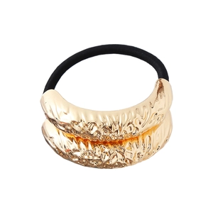 Punk style metallic gold ponytail holder with lava texture and elastic hair tie