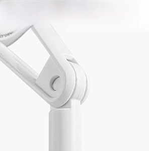 Detail of white foldable kitchen hook showing mechanical joint and dual mounting options