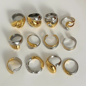 12-piece set of two-tone 18k gold and silver stainless steel rings with crystal accents