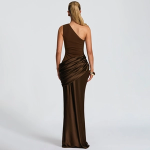 Detailed back view of a dark brown satin dress with elegant ruching and open back design