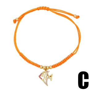 Bohemian orange woven rope bracelet with gold fish pendant and sparkling rhinestones