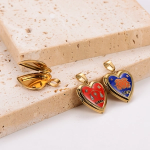 Golden heart-shaped stainless steel locket pendants with Libra and Leo zodiac motifs
