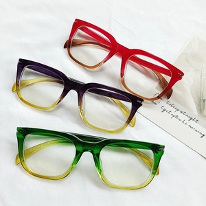 Three gradient colored retro square anti-blue light glasses frames on white fabric