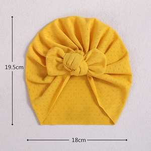 Yellow baby turban hat with bow knot design, measures 19.5cm height and 18cm width
