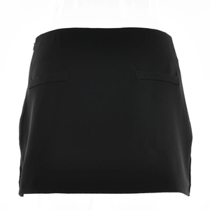 Detail view of a black A-line mini skirt featuring decorative back pockets and smooth fabric