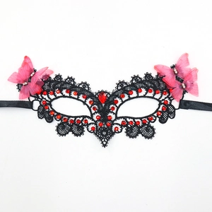 Intricate black lace butterfly half face mask with red rhinestones for Halloween parties