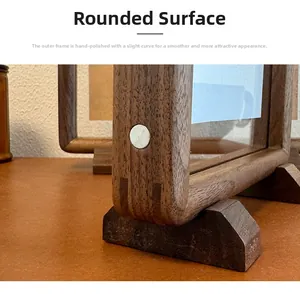 Close-up of hand-polished walnut wood picture frame with smooth rounded corners and magnets