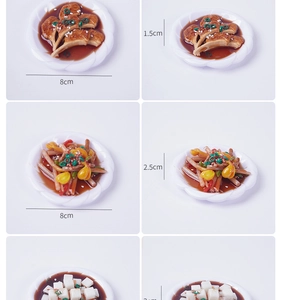 Detailed macro view of 8cm miniature resin food model with realistic scalloped plate
