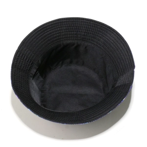 Detail view of the black bucket hat inner lining with reinforced multi-row stitching