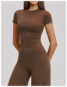 Detail view of slim-fit quick-dry yoga short sleeve T-shirt and high waist leggings set
