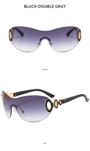 Detail of Y2K frameless gradient sunglasses with gold ring hinge and UV400 lenses