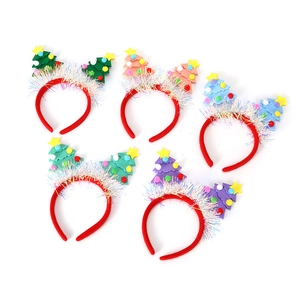 Five assorted colors of glittery Christmas tree headbands for holiday party costumes